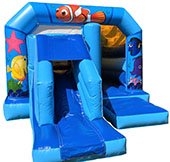 blue bouncy castle with an under the sea theme with a slide at the front